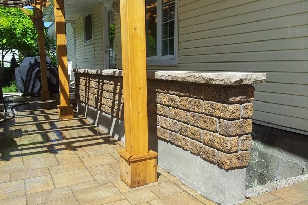 Brick wall with stone coping