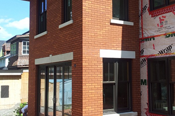 new brick addition with custom sills & lintels